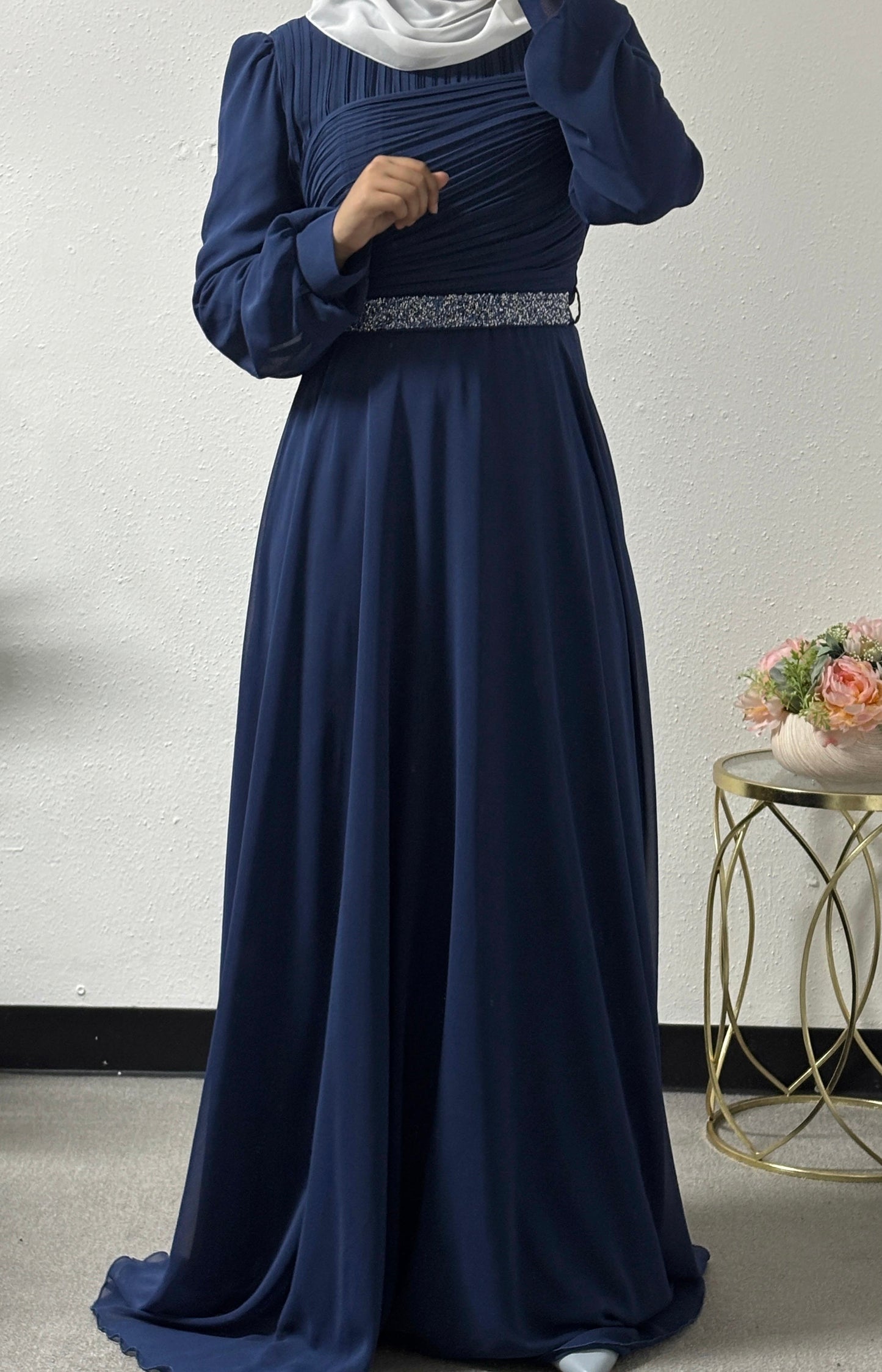 Modern dress with detailed belt