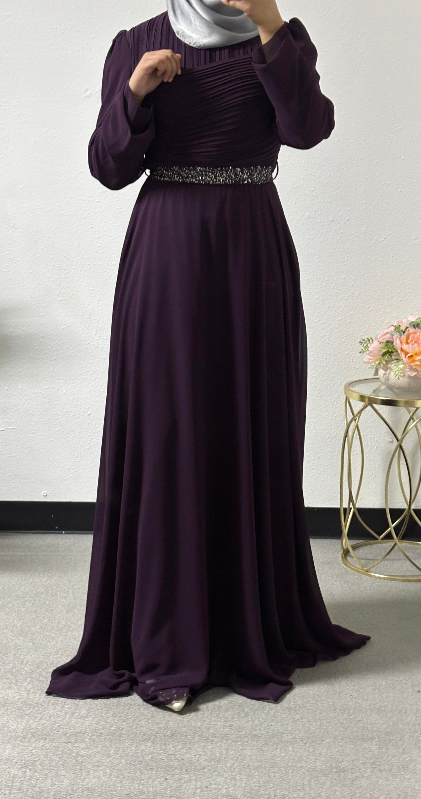 Modern dress with detailed belt