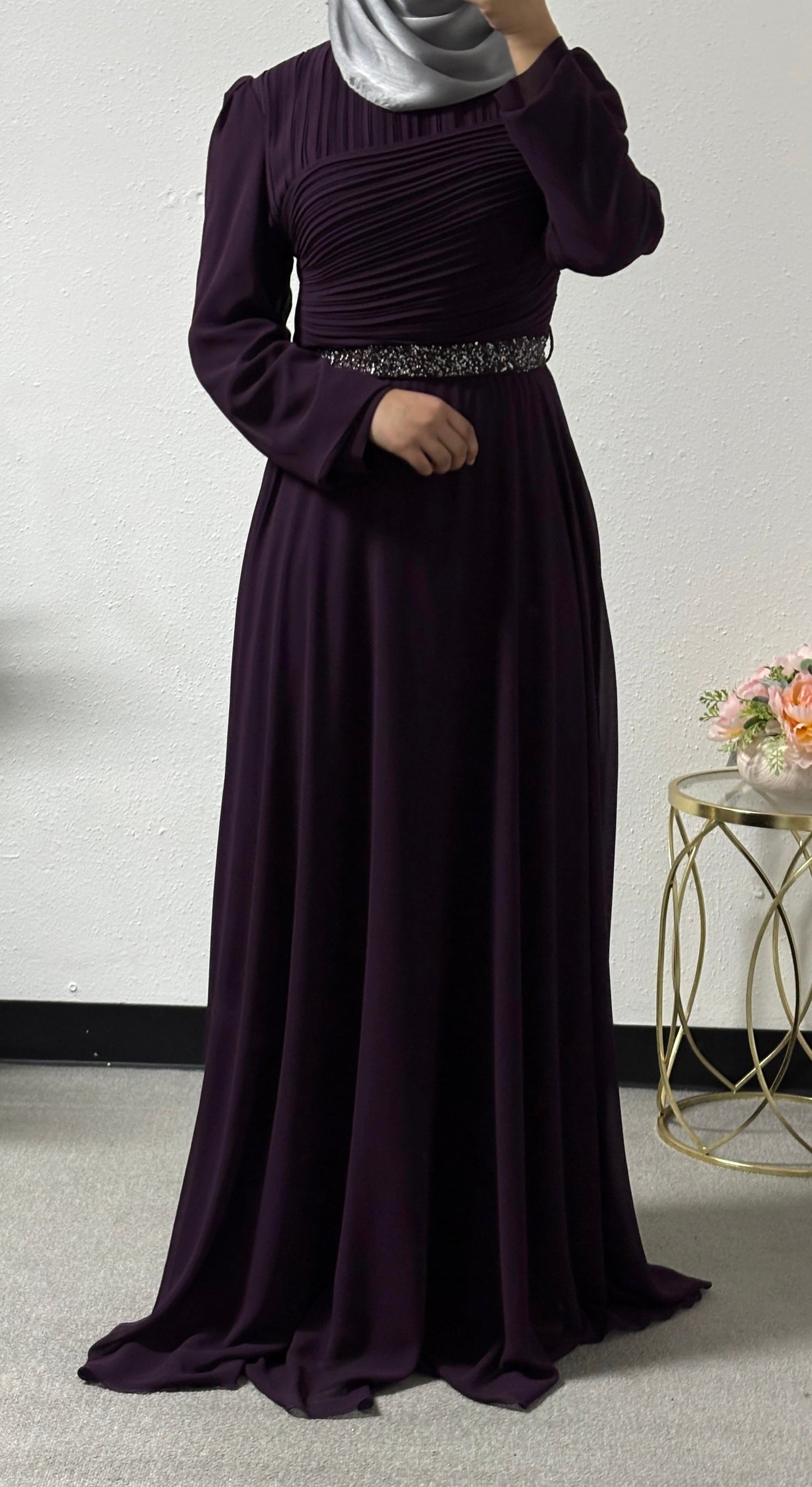 Modern dress with detailed belt