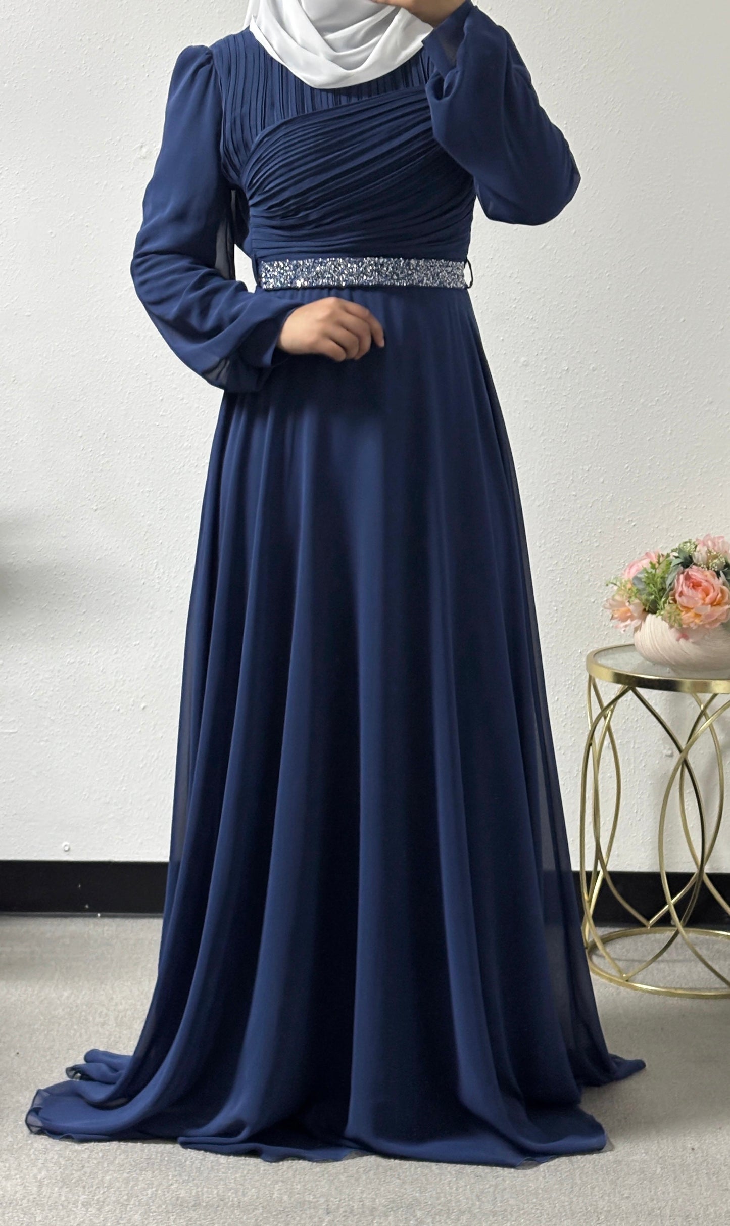 Modern dress with detailed belt