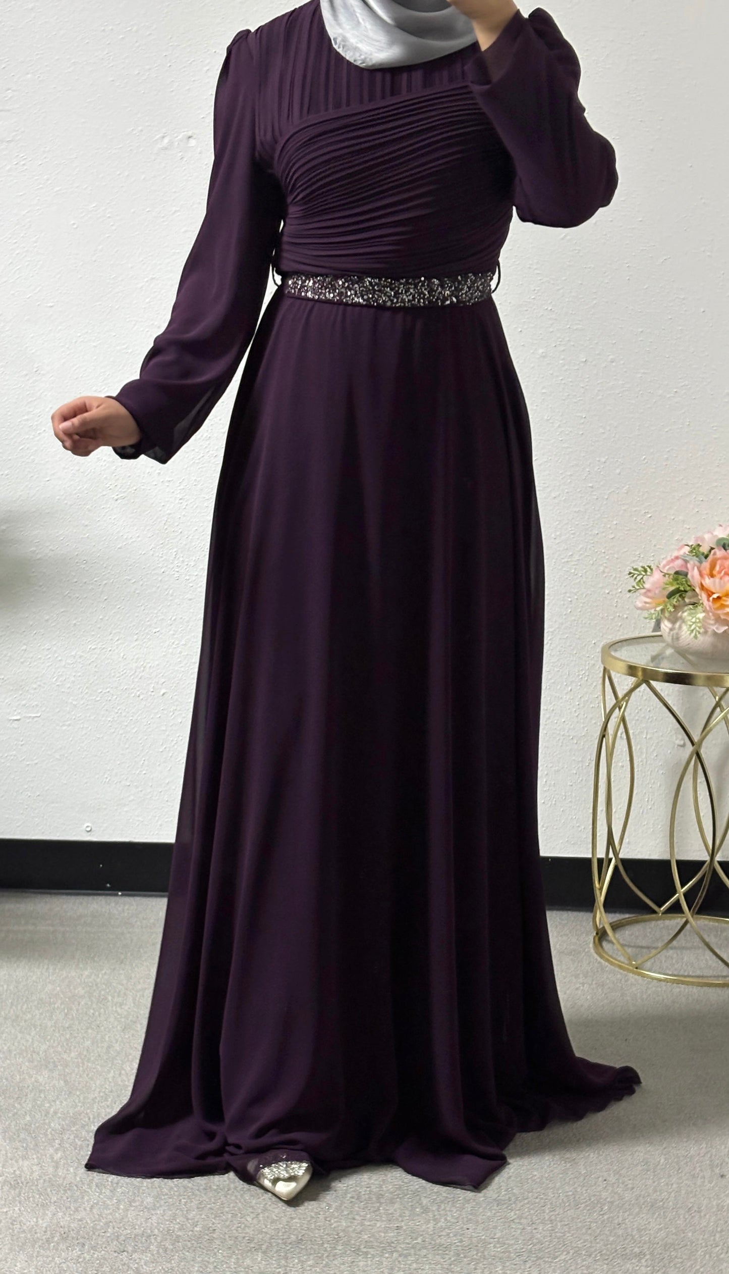 Modern dress with detailed belt