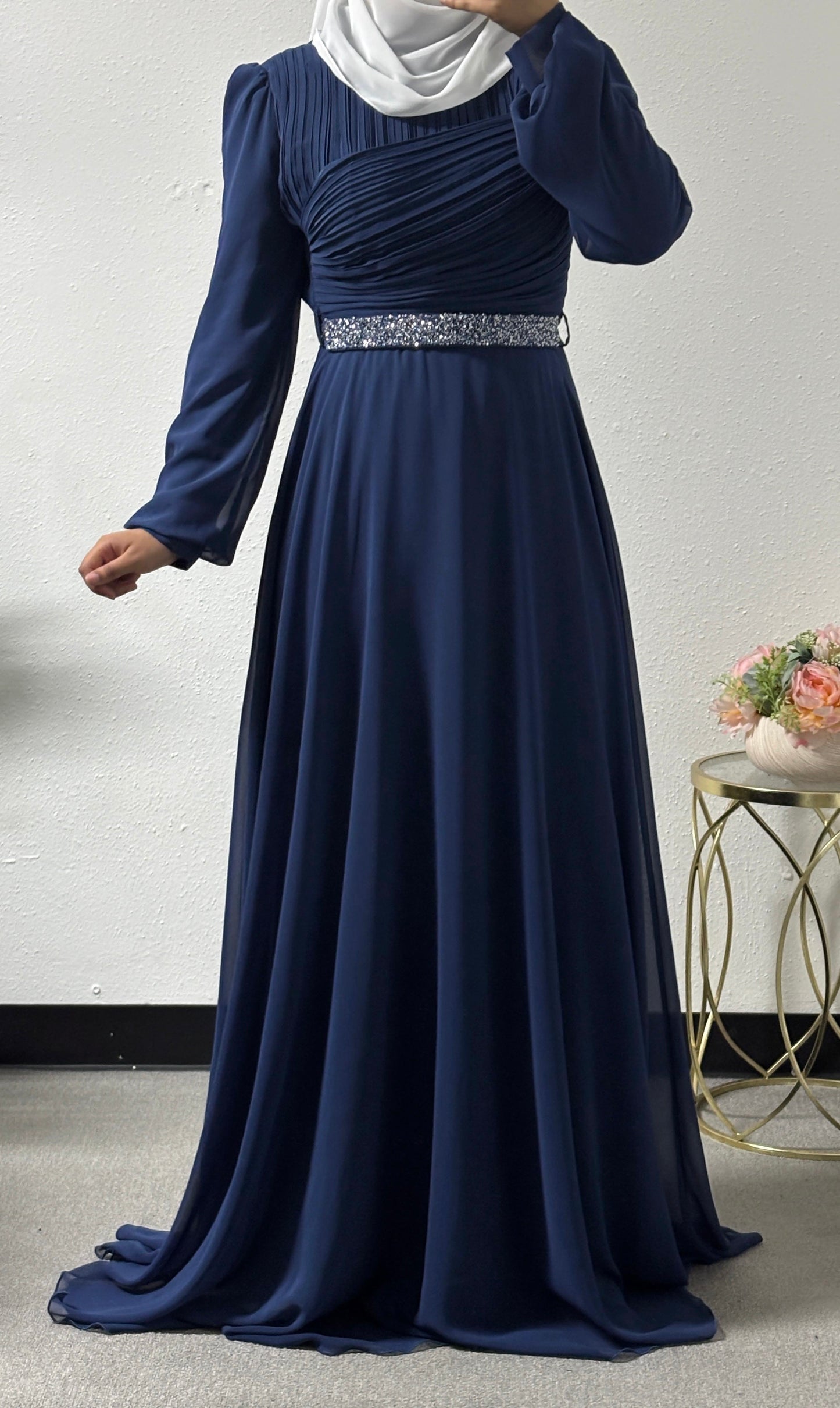 Modern dress with detailed belt