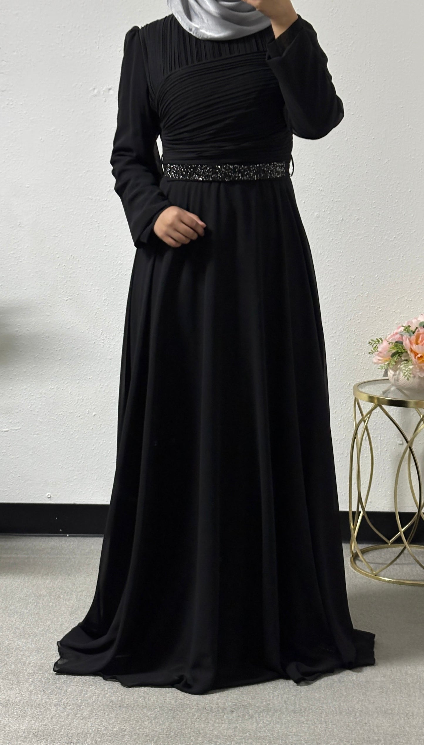 Modern dress with detailed belt
