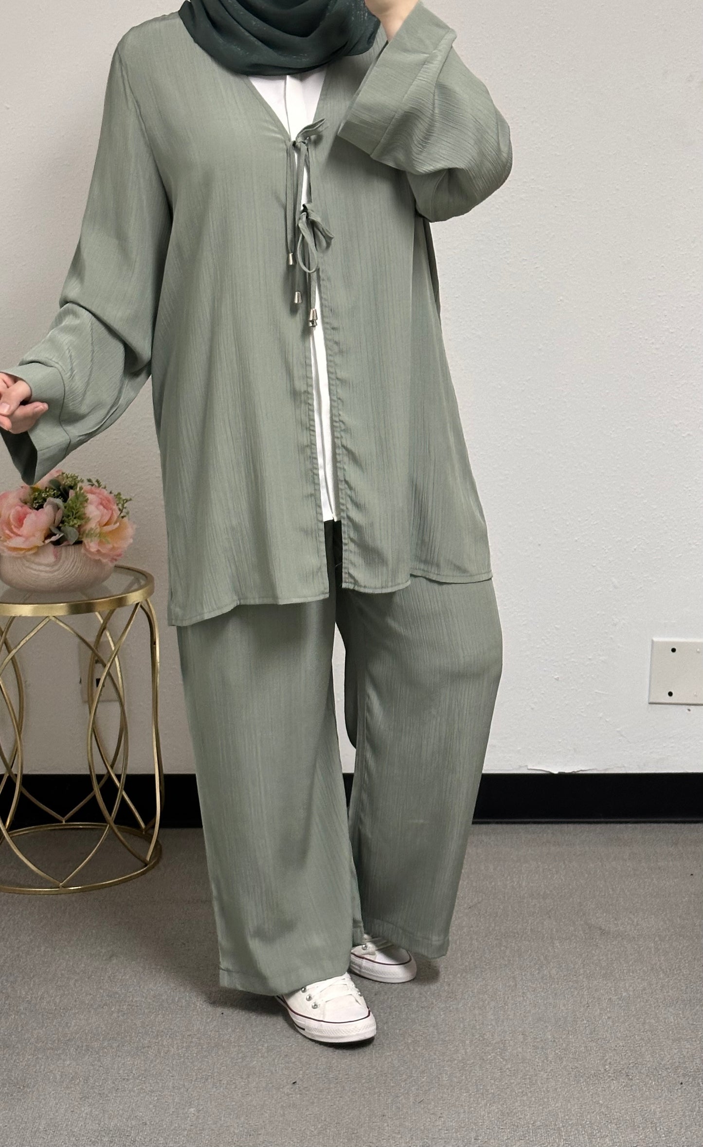 Three-piece set including a white inner shirt, jacket, and pants