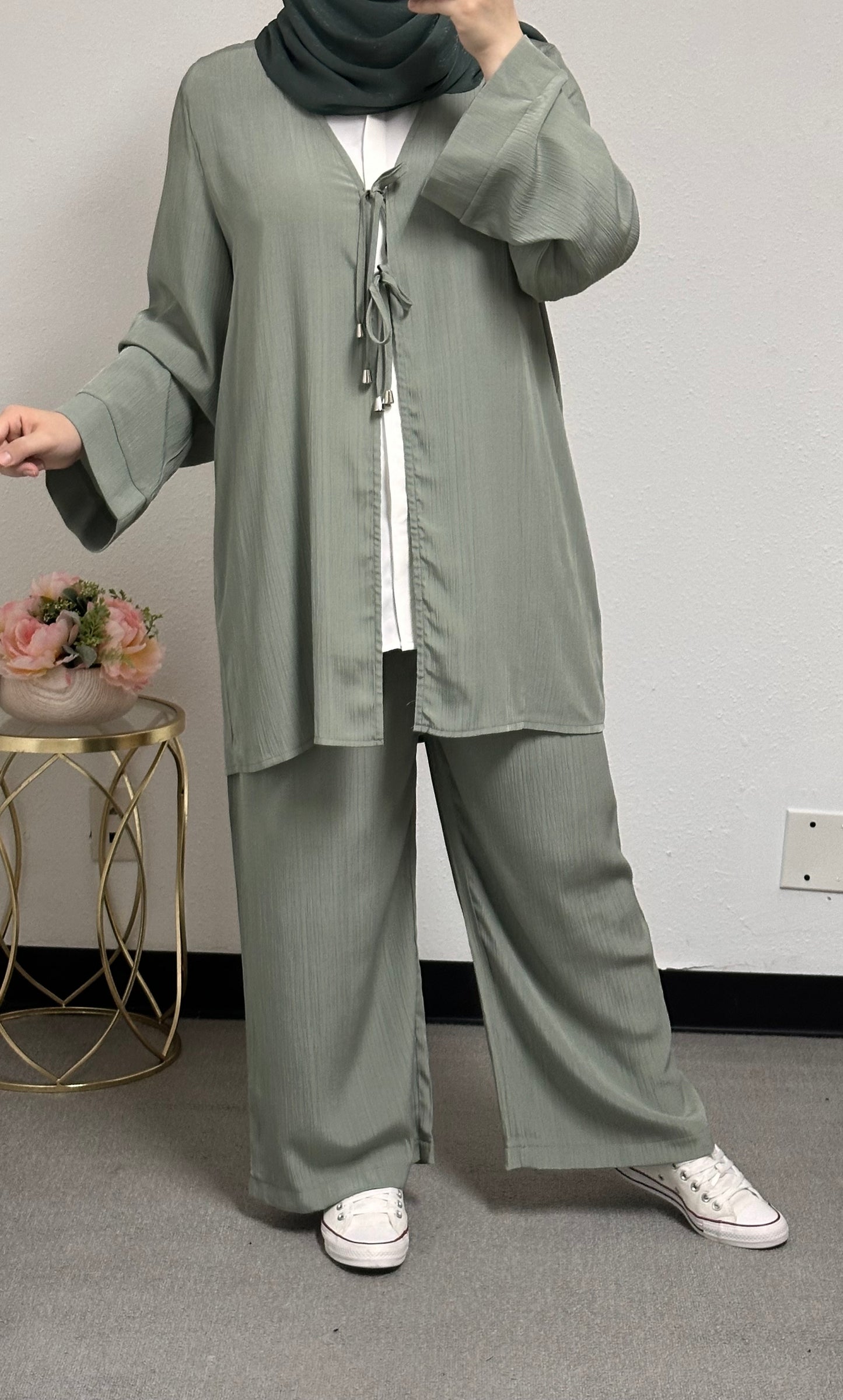 Three-piece set including a white inner shirt, jacket, and pants