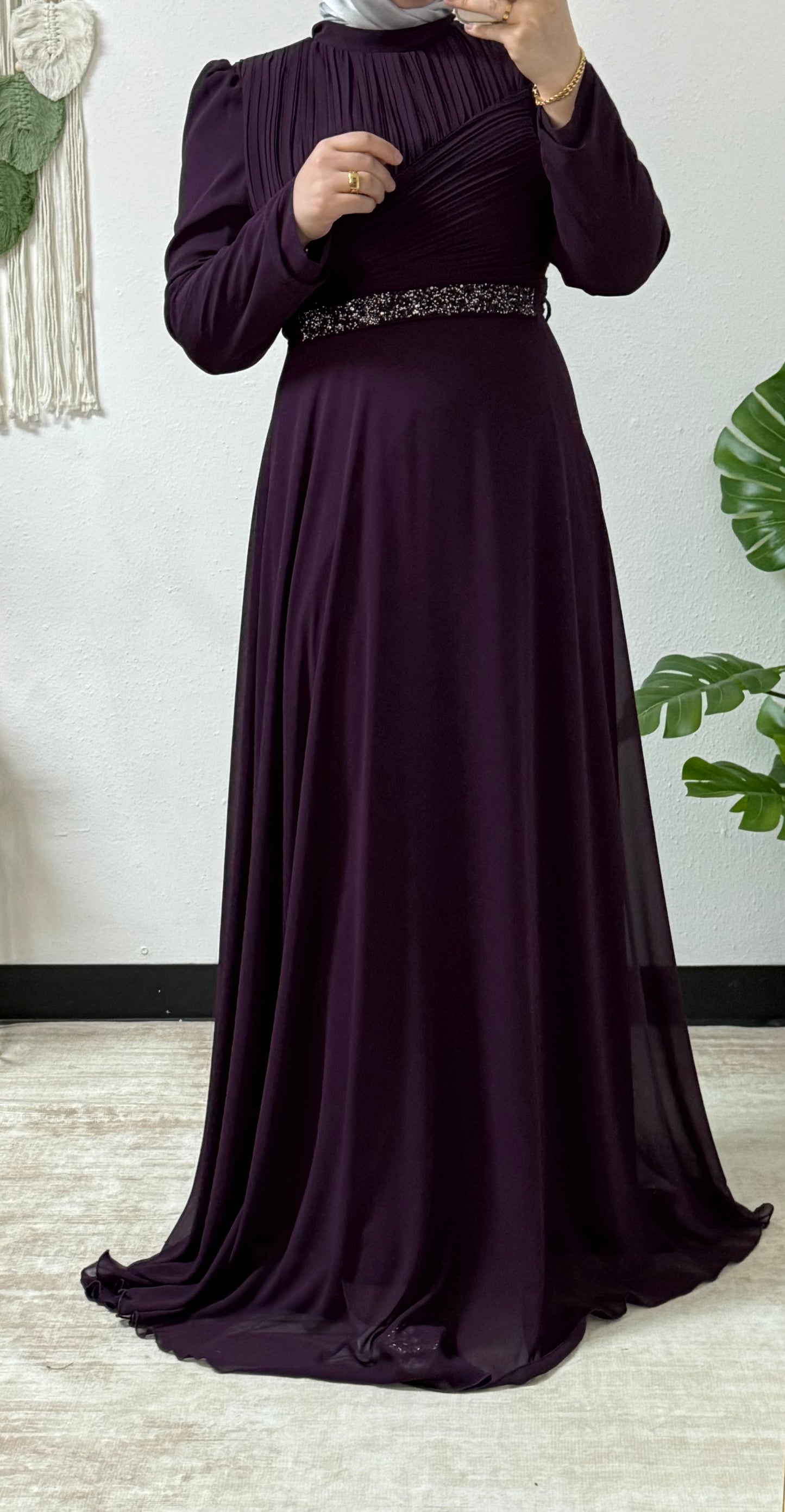 Modern dress with detailed belt