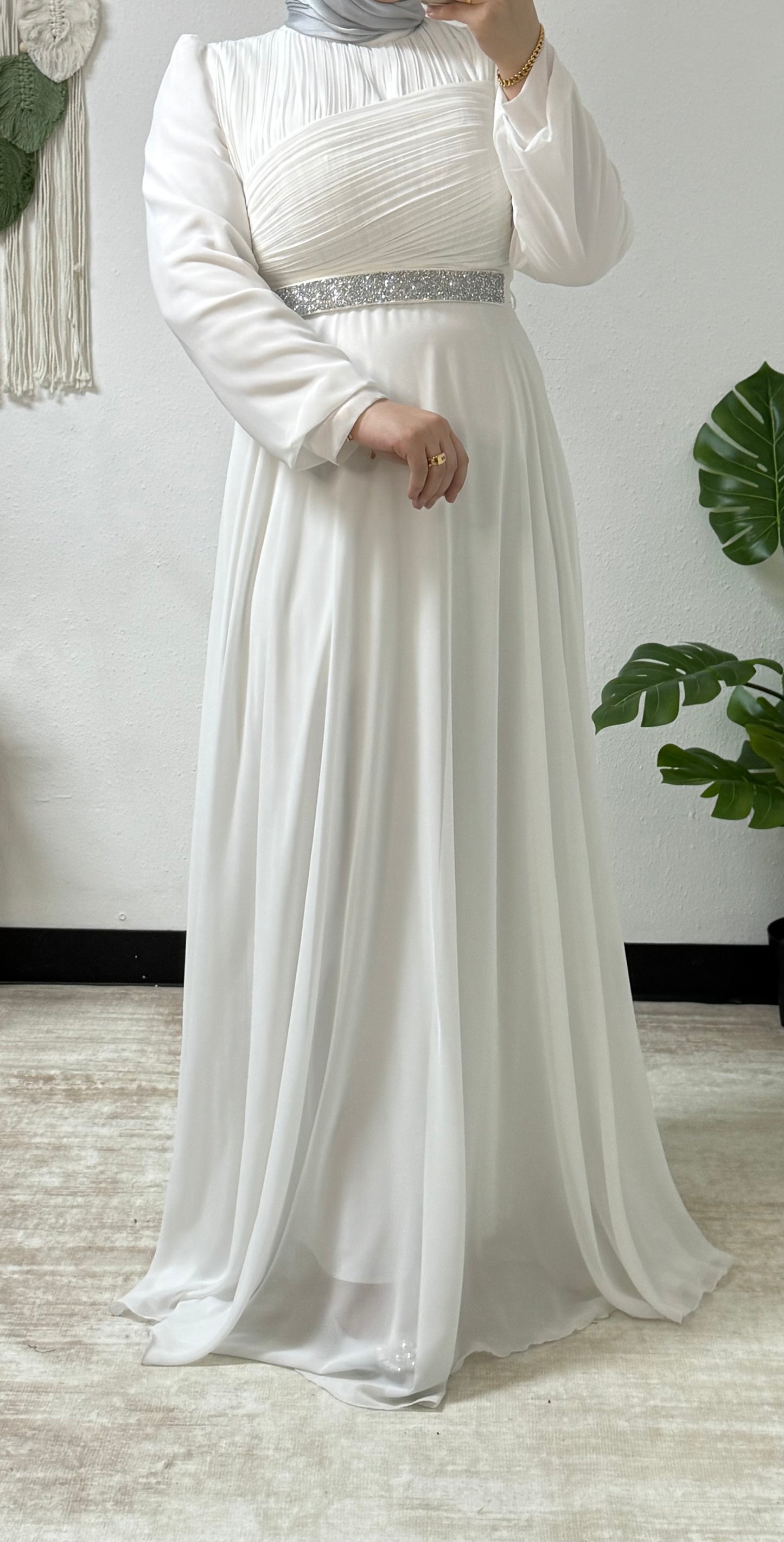 Modern dress with detailed belt