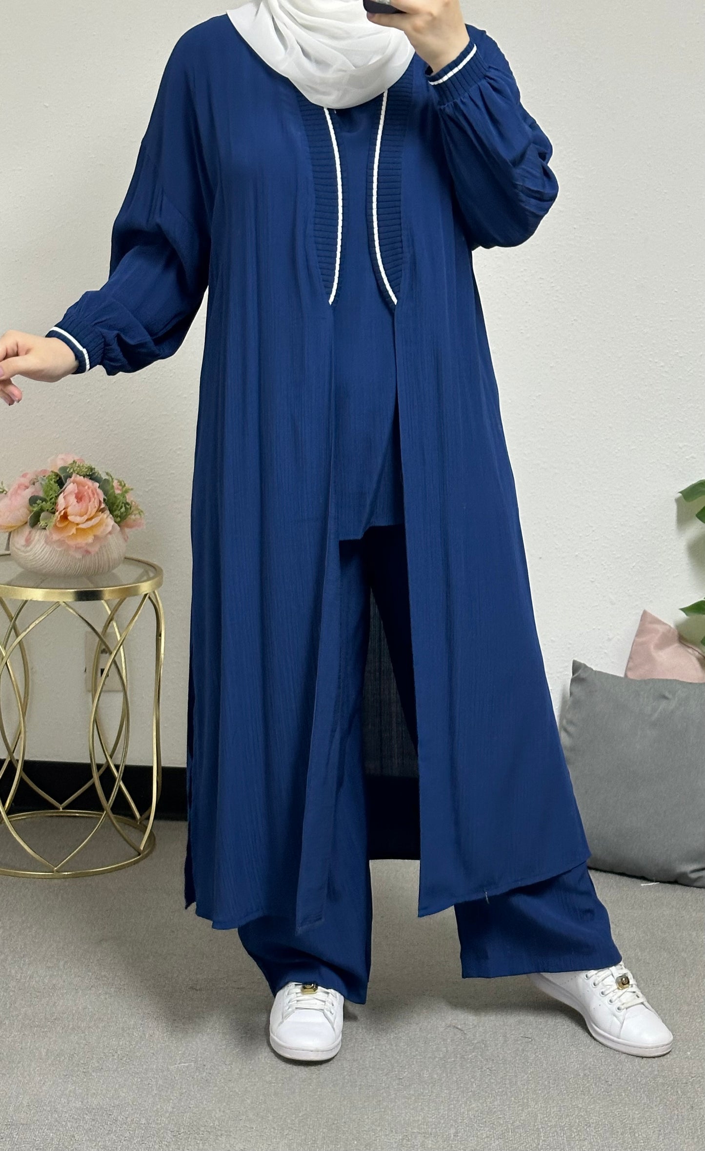 Three-piece set including a long cardigan, inner blouse, and pants