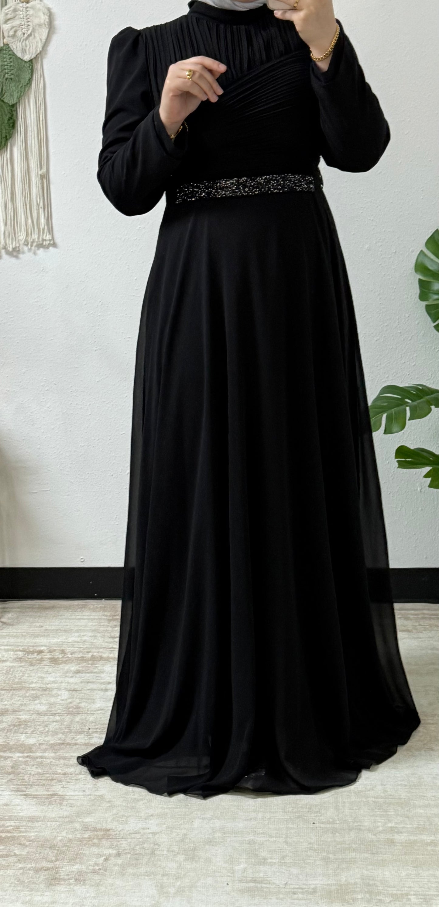 Modern dress with detailed belt