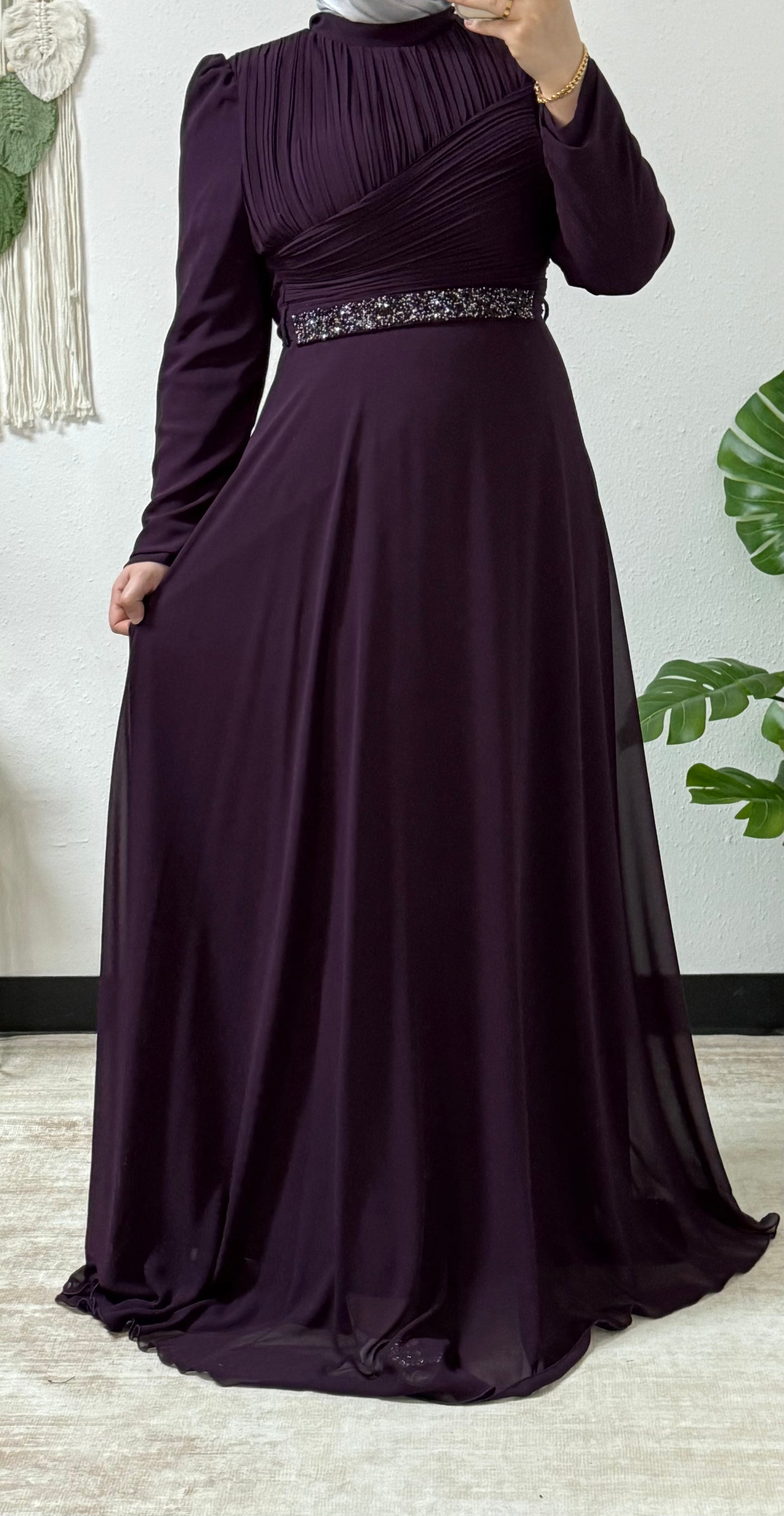 Modern dress with detailed belt