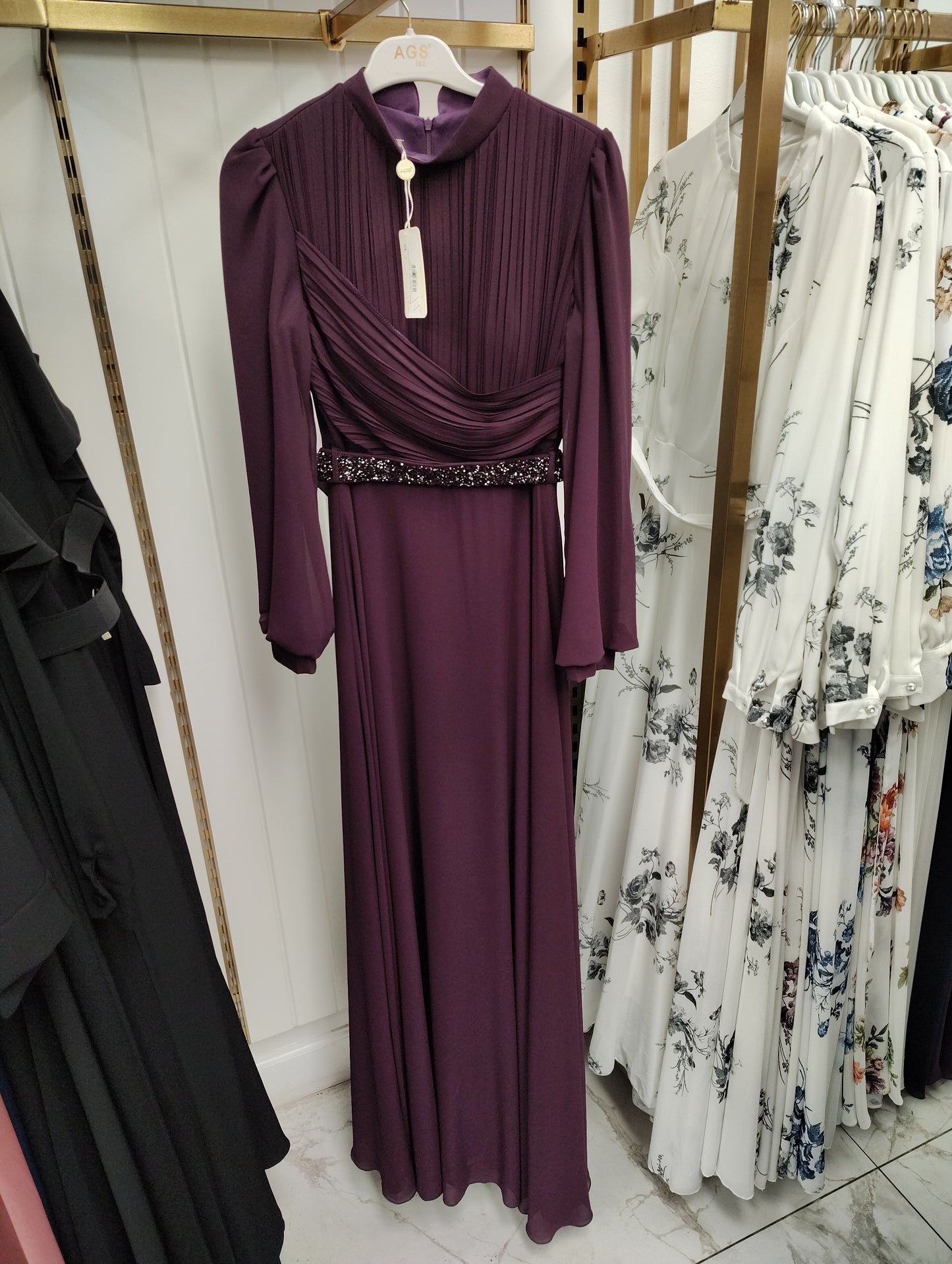 Modern dress with detailed belt